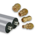 Four brass compression fittings displayed alongside two silver metal tubes with black foam sleeves and threaded ends, on a plain white background.