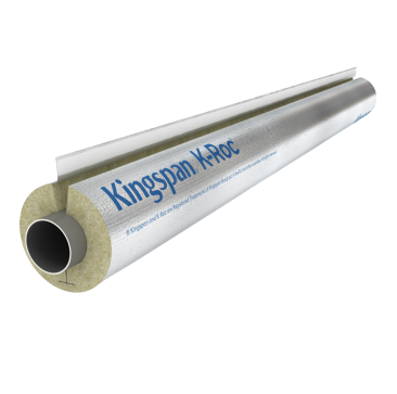 A cylindrical piece of pipe insulation labelled "Kingspan K-Roc" is shown against a black background. The insulation has a metallic outer layer and a fibrous inner material, with a slit along its length for easy installation around a pipe. The text on the
