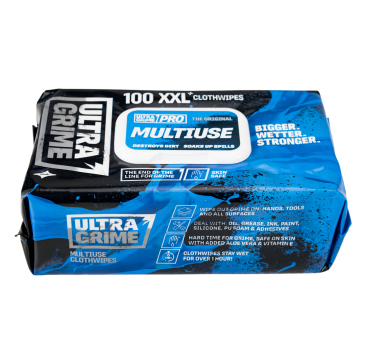 A close-up image of an "Ultra Grime Multi" cleaning wipe packet. The packaging is predominantly blue and white with black accents. The text "Ultra Grime Multi" is prominently displayed in bold white letters, with additional smaller text below describing t